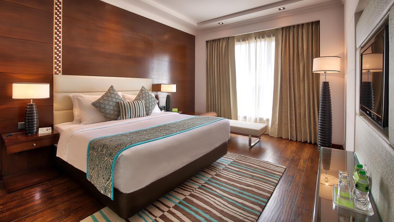 Radisson Jaipur City Center Εξωτερικό φωτογραφία A bedroom at the hotel