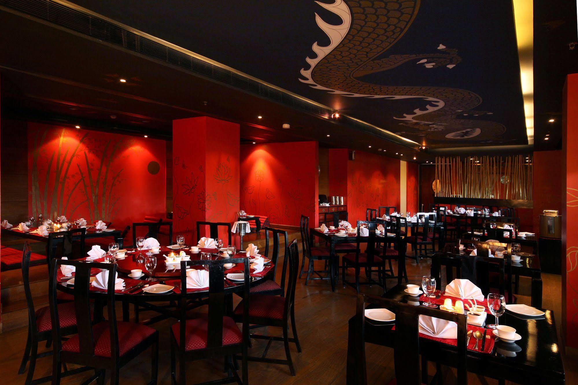 Radisson Jaipur City Center Εστιατόριο φωτογραφία Interior of a restaurant in Dubai